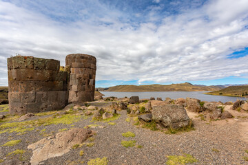 Fototapeta na wymiar Sillustani is a funerary complex where you can see a series of impressive tombs belonging to the Colla culture