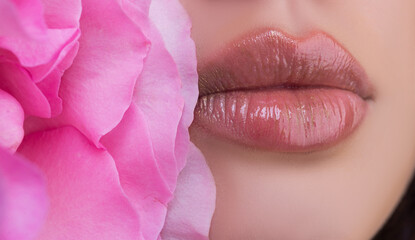 Sexy plump lips. Close-up female mouth. Perfect natural lip makeup. Close up part of beautiful woman face. Isolated lips.