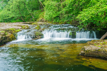 Small cascade, part of Sgwd Clun-Gwyn waterfall in Wales, UK.