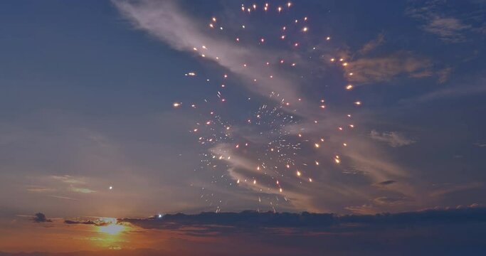 During the sunset of the celebration of the holiday, festive fireworks are launched into the sky