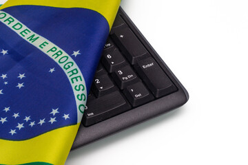 LAURO DE FREITAS, BRASIL - JULY 21, 2022 : brazilian flag with a keyboard
