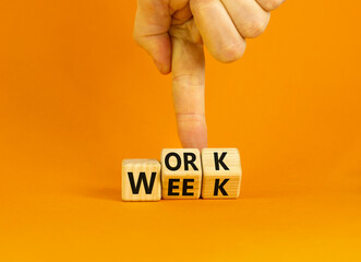 Work week symbol. Concept words Work week on wooden cubes. Businessman hand. Beautiful orange table orange background. Business and work week concept. Copy space.