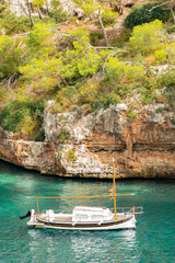 Fototapeta na wymiar Traditional spanish boat at the cliffs - 2363