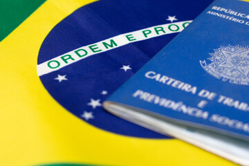 LAURO DE FREITAS, BRASIL - JULY 21, 2022 : Brazilian work document with Brazilian flag