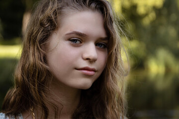 Beautiful girl relaxing on picnic in the park