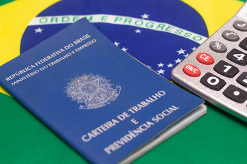 LAURO DE FREITAS, BRASIL - JULY 21, 2022 :brazilian work document with a brazilian flag and...