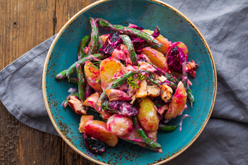 Potato, roast beetroots, green beans and salmon salad