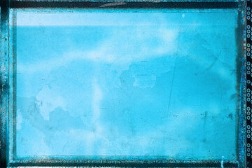 Artistic vintage style colorful photo with film frame and grain with wet plate technique  - Blue abstract blurred marble-like water background