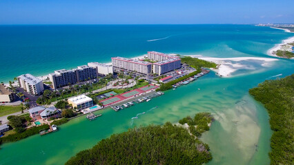 Obraz premium Aerial View of the Bay and the Gulf of Mexico with the Beach and a Shallow Pass, Showing Little Hickory Island in Bonita Springs, Florida Drone View
