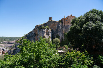 Fototapeta na wymiar former fortress village with an active church built atop a limestone outcrop 