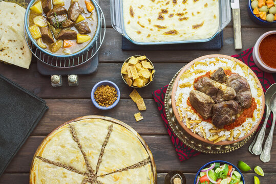 Arabic cuisine; Middle Eastern traditional lunch. It's also a meat-based meal to celebrate "Eid-Al Adha" or "The Festival of the Sacrifice". Assorted of Egyptian oriental dishes. 