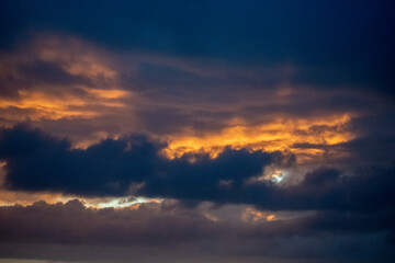 Naklejka na ściany i meble Sky with clouds, sunrise at the Mount Maunganui.