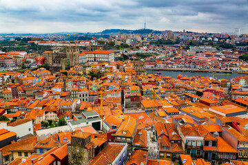 Aerial view of old historical buildings of Porto city and Vila Nova de Gaia with Douro River, Portugal