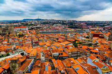 Aerial view of old historical buildings of Porto city and Vila Nova de Gaia with Douro River,...