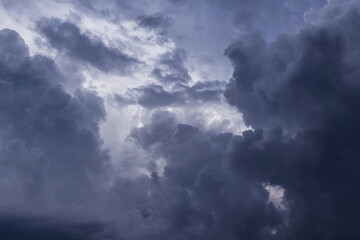 Fototapeta na wymiar Storm cloudy dramatic sky with dark rain grey cumulus cloud background texture, thunderstorm, heaven 
