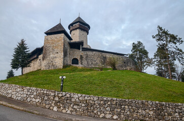 Fototapeta na wymiar Medieval fortress. Walls and towers on old castle. Velika Kladusa, Bosnia and Hercegovina. 