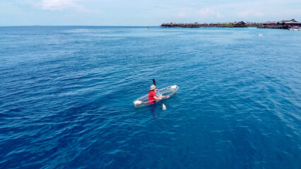 woman kayaking on the ocean
