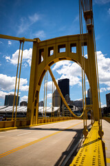 Part of famous Rachel Carson yellow bridge with downtown Pittsburgh, Pennsylvania in the background...