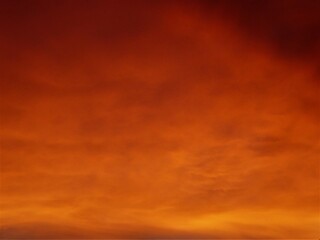 Sunset casting orange and red glow as the last of the day disappears.
