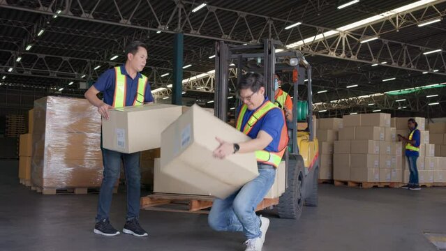 A warehouse is a location where products are stored and distributed. An accident at work causes a warehouse worker to trip and fall while attempting to pick up a cardboard box from the forklift.