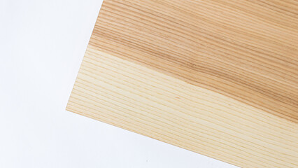 Wood texture. Light wooden board. A sample of a saw cut tree. Photo of live wood texture for furniture samples. Isolated on white background.