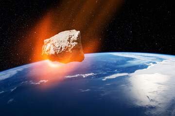 Planet Earth and big asteroid in the space. Potentially hazardous asteroids. Asteroid in outer...