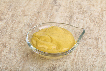 Organic mustard sauce in the bowl