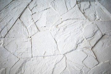 White rough bricks concrete wall, Caldding stones wall, Cement texture, White painted colour background, Close up shot