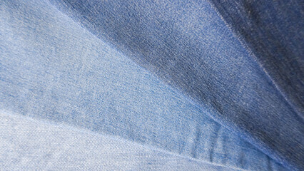 Denim fabric light to dark different shades abstract background 