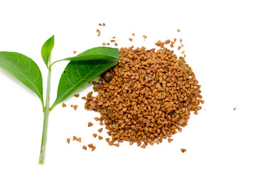 Mehendi or henna leaves and powder heap isolated on white background, Lawsonia inermis powder, Herbs for hair.