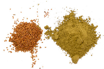 Mehendi or henna leaves and powder heap isolated on white background, Lawsonia inermis powder, Herbs for hair.