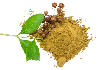Mehendi or henna leaves and powder heap isolated on white background, Lawsonia inermis powder,...