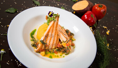 Typical Peruvian dish, trout with mashed potatoes on a restaurant table.