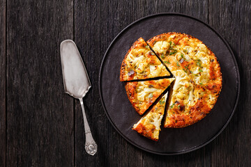 Cauliflower Cake with cheese, basil, top view