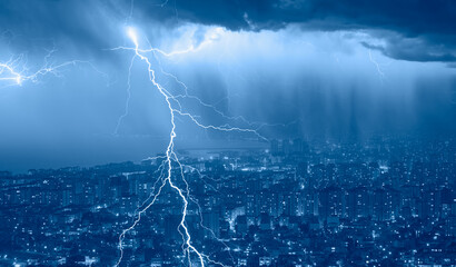 Lightning thunderstorm flash over the city at night sky - Lightning storm over city with rain - obrazy, fototapety, plakaty