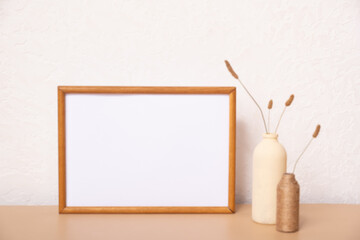 Mock up empty wooden frame mockup, dried grass in vase on white background, interior, home design....