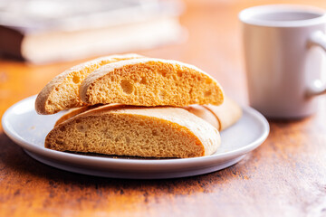 Sweet anicini cookies. Italian biscotti with anise flavor on wooden table.