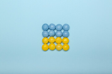 sweets in yellow-blue colors on a blue background