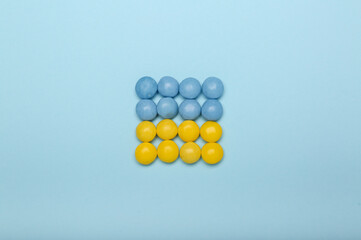 sweets in yellow-blue colors on a blue background