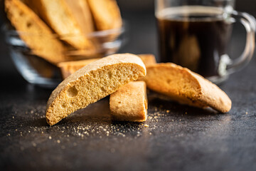 Sweet anicini cookies. Italian biscotti with anise flavor on black table