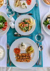 Turkish meatball, Adana and salads with vegetables from above
