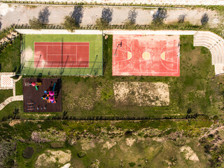 Aerial view of tennis and basketball courts. 