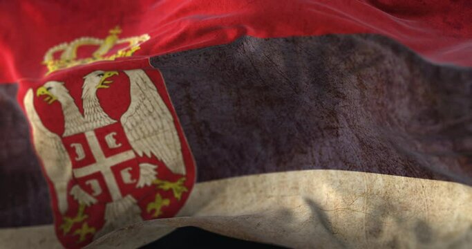 Old Serbia Flag waving at wind. Loop