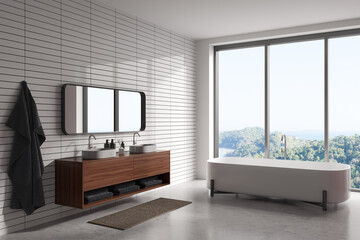 Corner view on bright bathroom interior with bathtub, large mirror