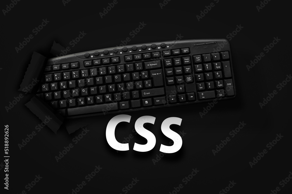 Poster PC keyboard with CSS word on black background
