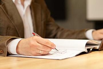 businessman signing a document