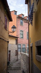 Fototapeta na wymiar Narrow street in the town of Lisbon, Portugal