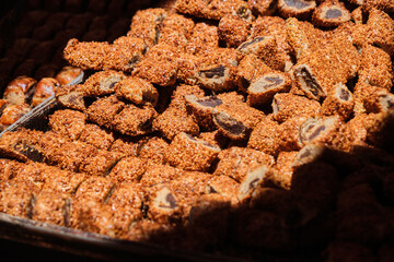 close up of a pile of dried chocolate chips, local taste with sesame seed in Mardin Turkey.