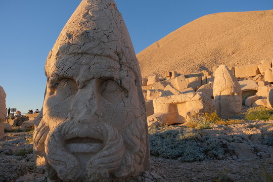 ancient ruins of Nimrod local name is Nemrut Dagi during sunset.