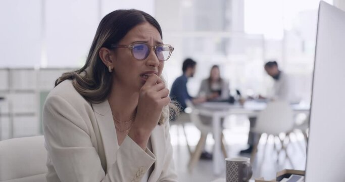 Stressed intern making mistake while analyzing business or company data on a desktop. Worried professional with anxiety, biting nails while looking for a solution. Female trying to meet a deadline